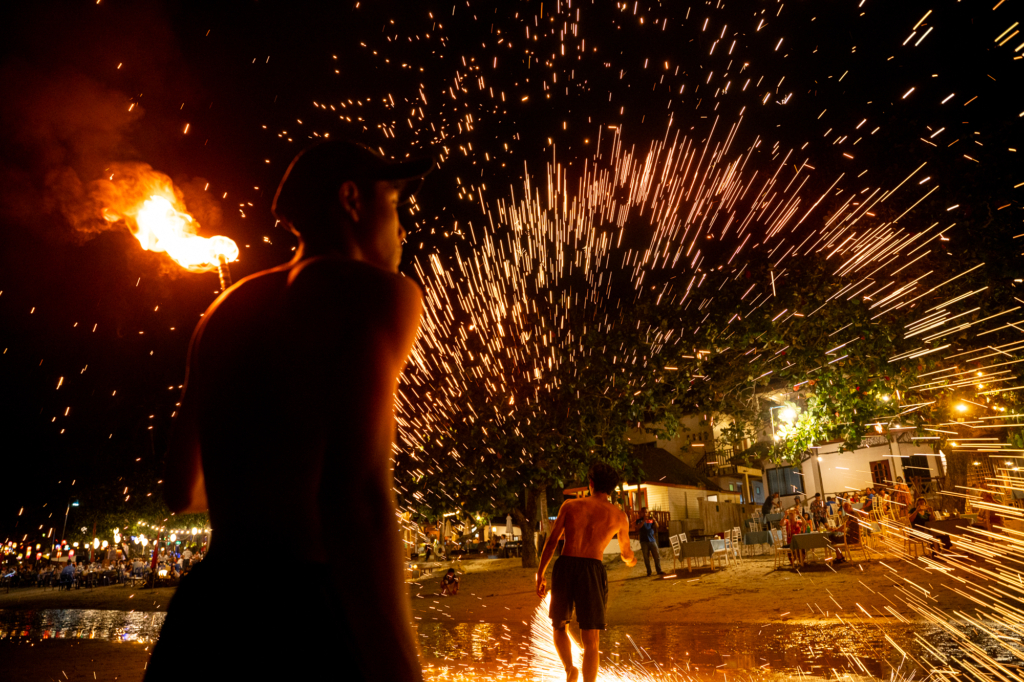 Hakbong Kwon, SEA: Day and Night, Performance by a Beach Boy Setting the Evening Mood, 2024, Ko Chang, Thailand